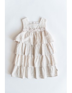 vestido beige con vuelos