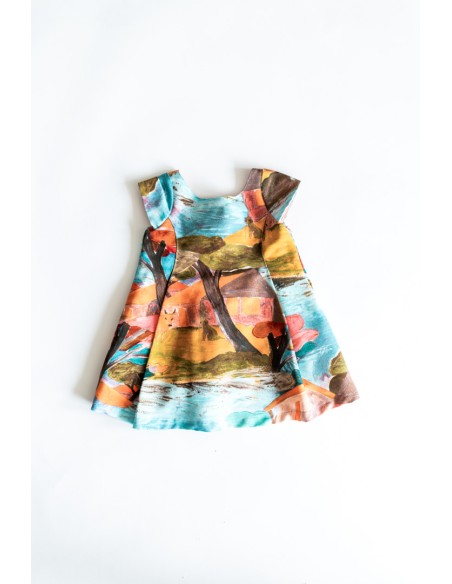 vestido turquesa con colores naranja mostaza y fucsia