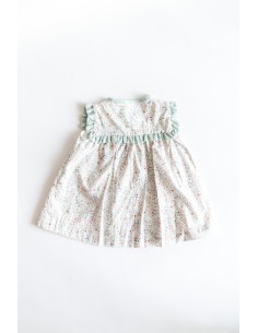 vestido blanco con flores y detalles turquesas