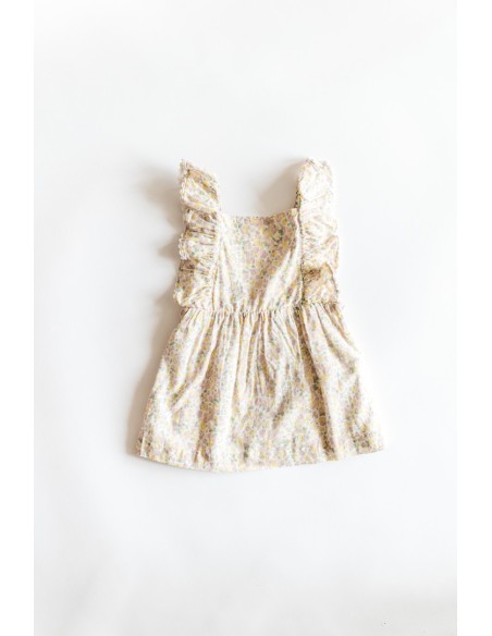 vestido blanco con flores amarillas y rosadas