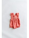 romper rosado con flores bordadas en pecho