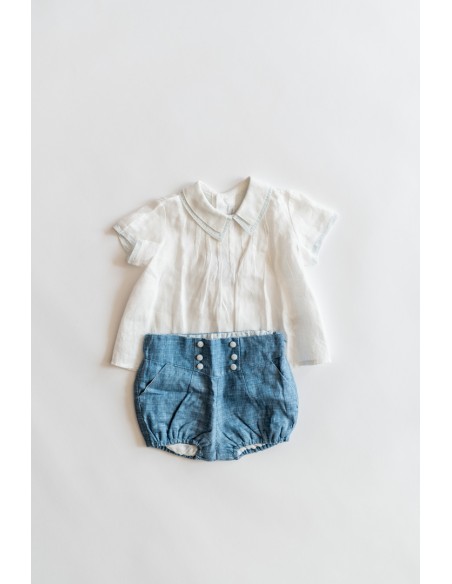 set short celeste y camisa blanca con detalles turquesas
