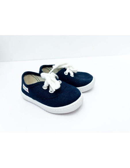 zapatos de lona azul oscuro