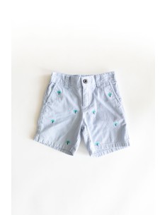 short rayas celestes y palmeras