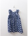 vestido azul con bolas blancas y lazo amarillo