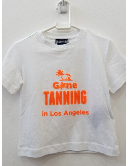 camiseta blanca con dibujos naranja