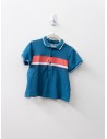 camisa tipo polo turquesa con franja rosada
