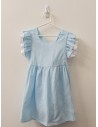 vestido celeste con detalles de tela blanca