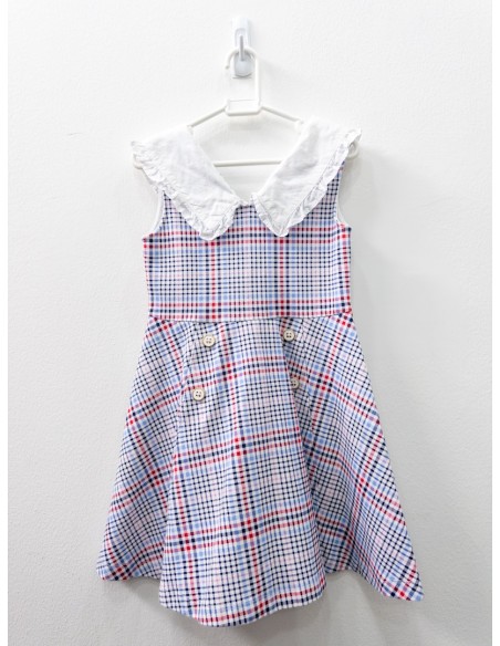 vestido cuadros rojos, azules y botones blancos