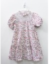 vestido con mangas blanco con flores rojas y azules