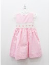 vestido rosado con nido de abeja blanco con florsitas