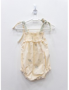 monito beige con flores celestes