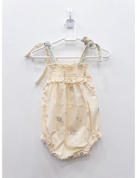 monito beige con flores celestes