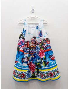 vestido blanco con paisaje en colores azules fucsias y amarillo