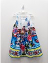vestido blanco con paisaje en colores azules fucsias y amarillo
