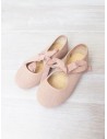 zapatos rosados con lazos