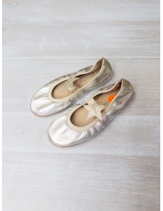 zapatos plateados con estrella