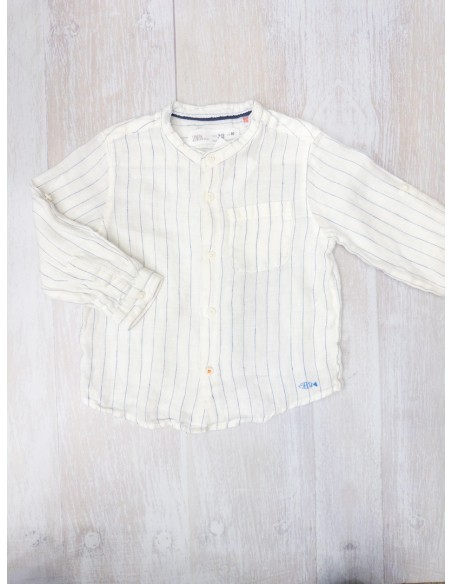 camisa blanca lineas azules