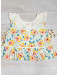 top celeste con flores rosadas con amarillo