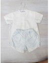 set short bolitas celestes y top blanco