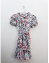 vestido blanco con flores verdes y concho de vino