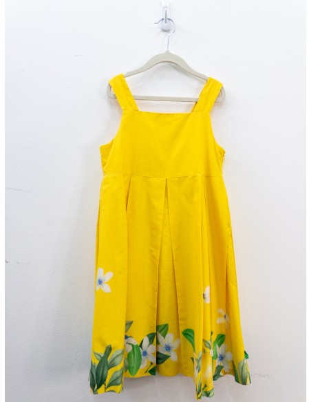 vestido amarillo con flores blancas al borde