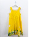 vestido amarillo con flores blancas al borde