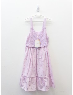 vestido morado con tejido arriba y flores
