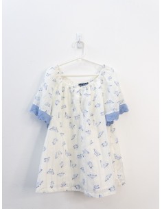 set blusa blanca de mariposas y pantalon morados