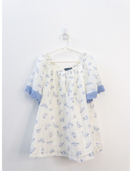 set blusa blanca de mariposas y pantalon morados