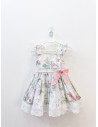 vestido blanco con personajes y filitos rosados