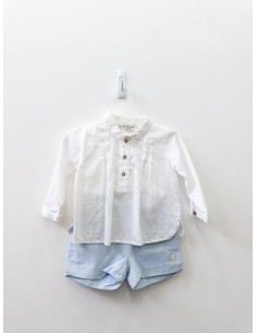 set camisa blanca de puntos celestes y short celeste