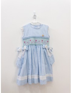 vestido celeste con bordados fucsias