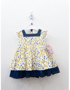 vestido blanco con flores amarillas y detalles azul