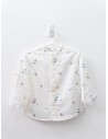 camisa blanca con palmeras negras
