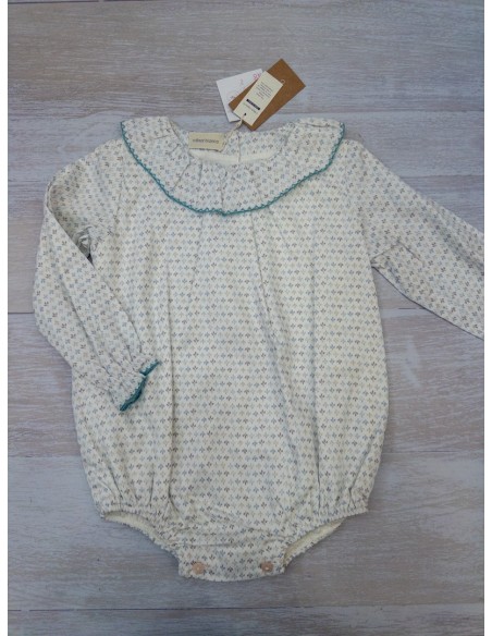 enterizo manga larga blanca con hojas turquesas