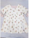 vestido blanco con flores rosadas