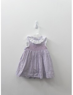 vestido rosado con bolitas azules y amarillos