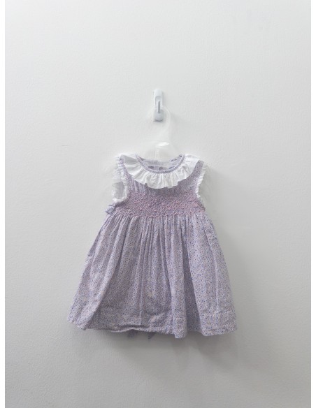 vestido rosado con bolitas azules y amarillos