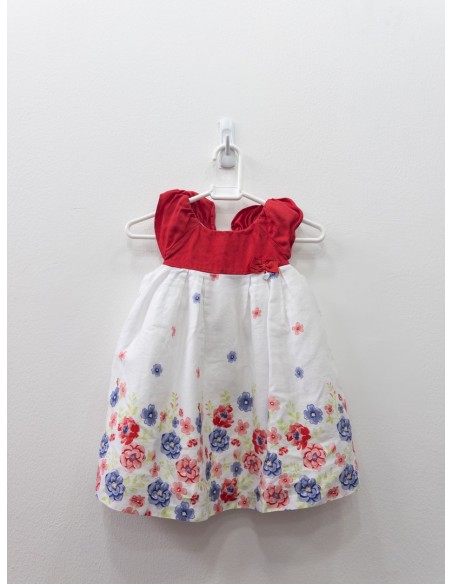 vestido blanco con pecho rojo y flores rojas y azules