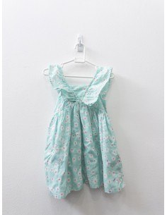 vestido turquesa con flores blancas