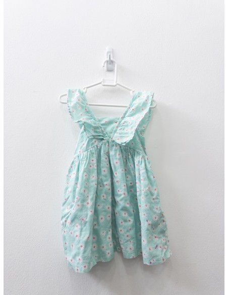 vestido turquesa con flores blancas