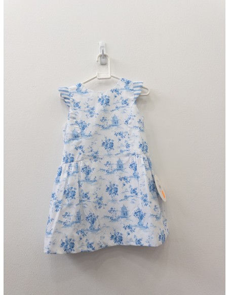 vestido blanco con dibujos celestes