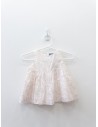 vestido blanco con bolas fucsia neon
