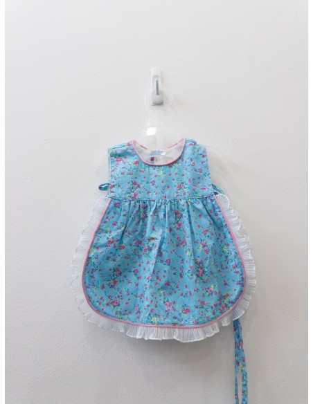 vestido turquesa con flores fucsias