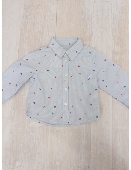 camisa rayas celestes con dibujos rojo amarillos verde