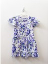 romper blanco con flores moradas