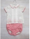 set short rosado y camisa blanca con rosado