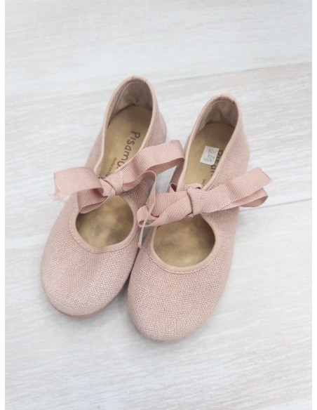 zapatos rosados con cinta de amarrar