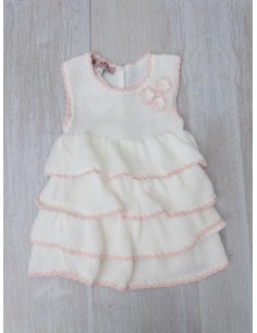 vestido de punto blanco con detalles rosa